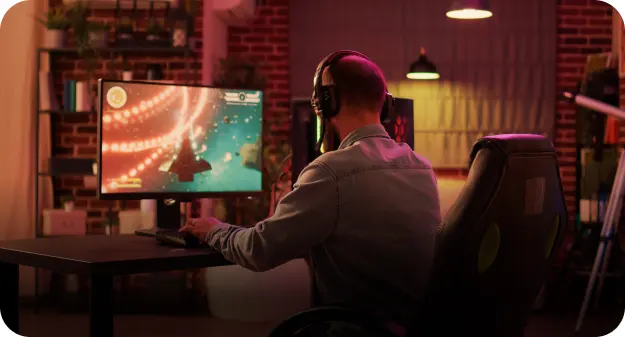 A man gaming on his gaming setup